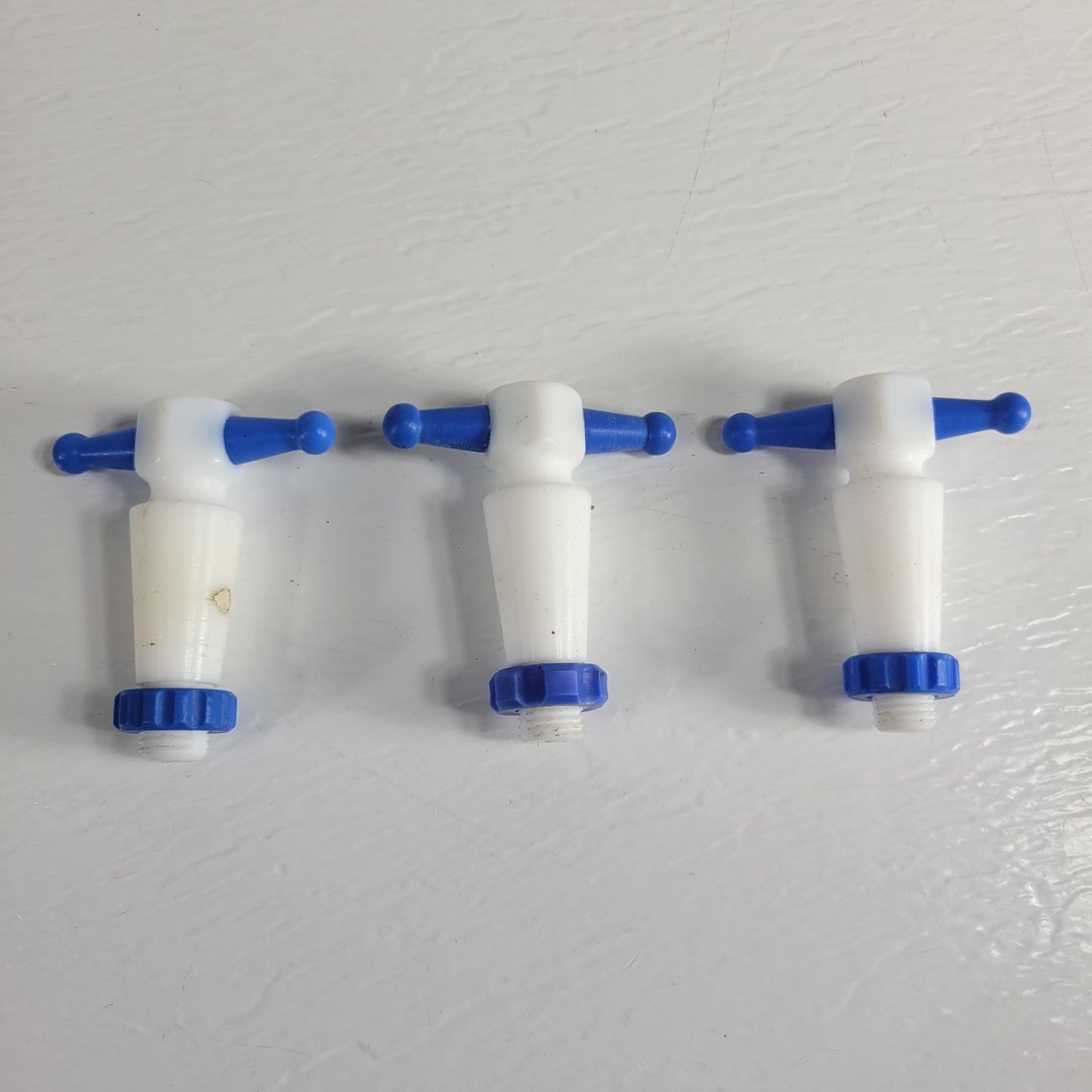 Three PTFE 17/28mm 4mm Bore Tapered Stopcocks for Glassware in Labs, Blue