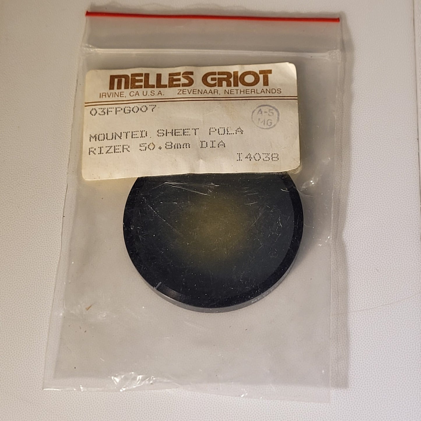Melles Griot 03FPG007 50.8mm Lens Mounted Sheet Polarizer Filter