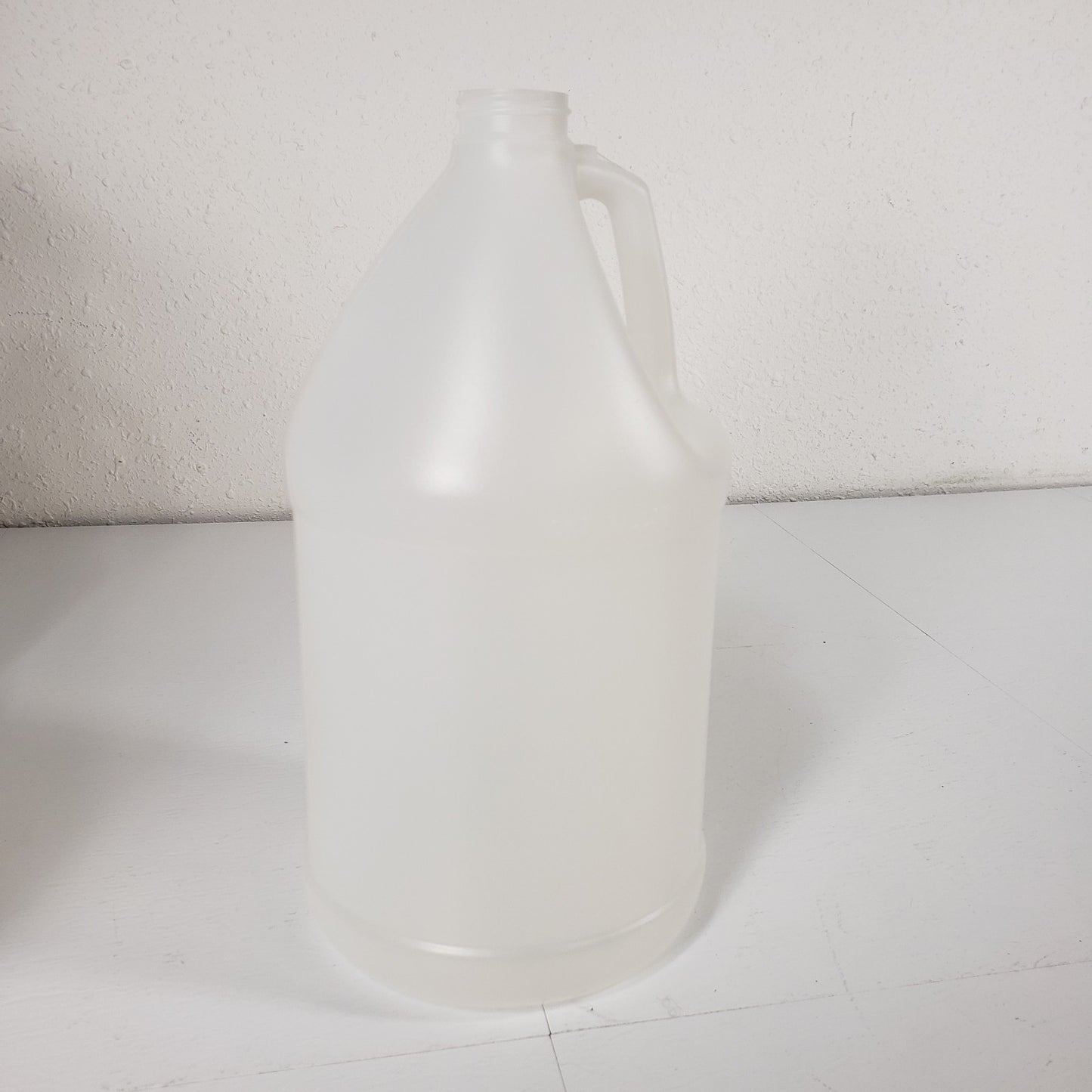 Plastipak Packaging Inc 4-1 Gallon Plastic Bottles With Caps Clear HDPE