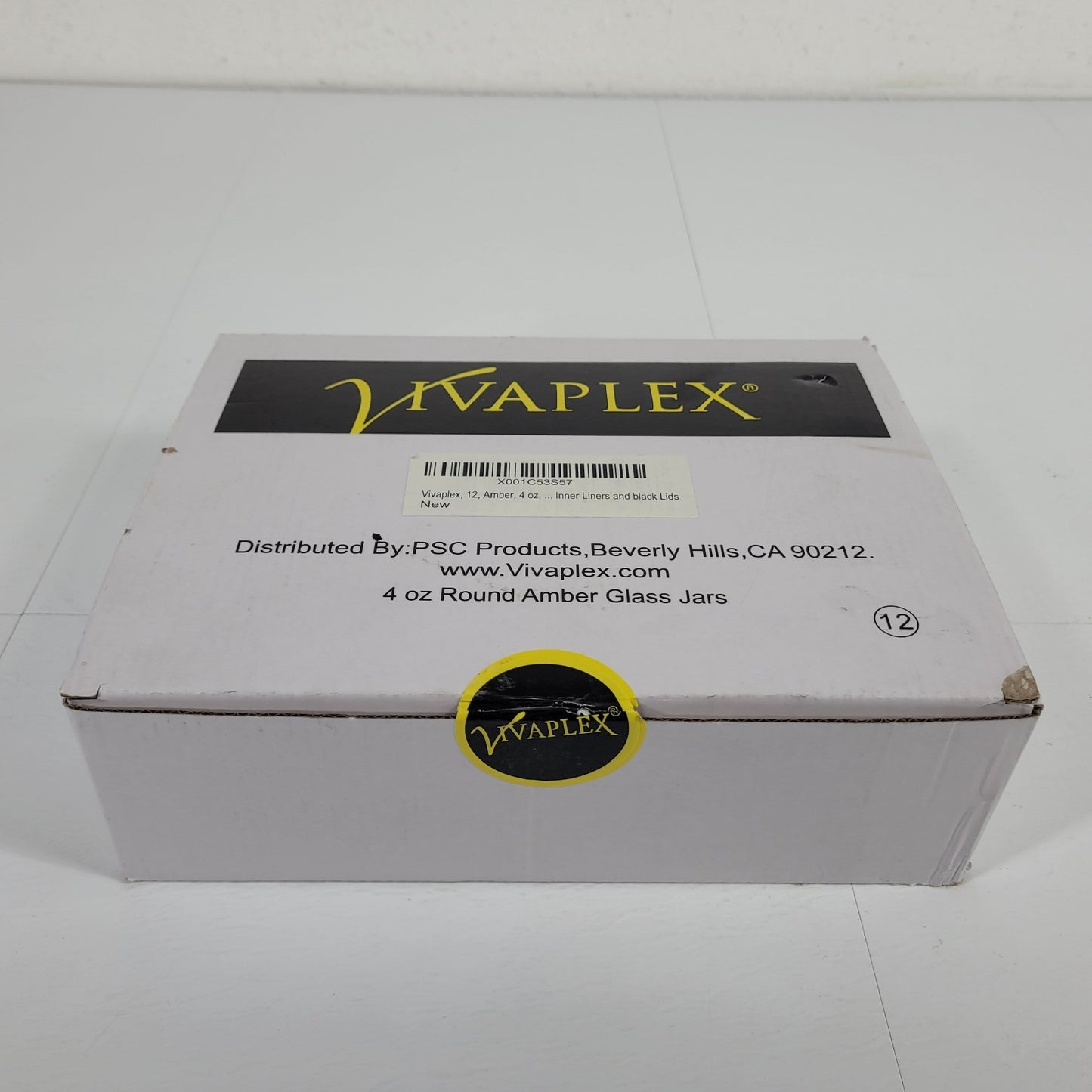 Vivaplex Amber 4 Oz Round Glass Jars with Inner Liners and Black Lids - 12 Pack