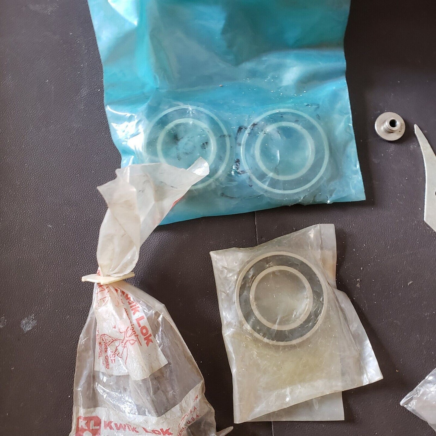 Lot of 12 Kwik-Lok Parts Bearings Rollers