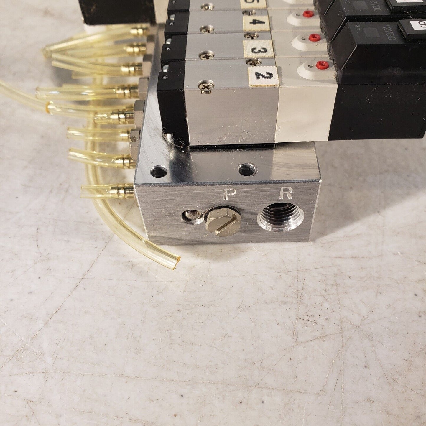 Koganei 040M6A-64W Manifold Block with (7) A040-4E1-37W Solenoid Valves 0.3MPa