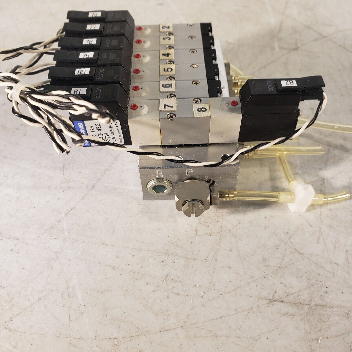 Koganei 040M6A-64W Manifold Block with (7) A040-4E1-37W Solenoid Valves 0.3MPa