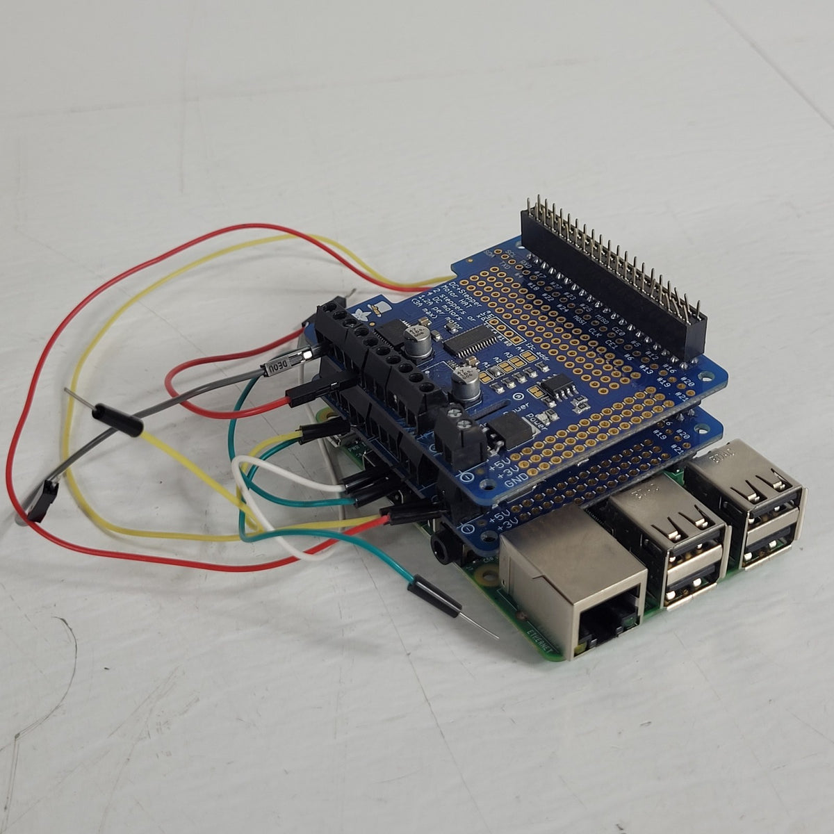 Raspberry Pi 3 Model B+ 1GB w/ 2 Adafruit DC Stepper Motor HATs 2348