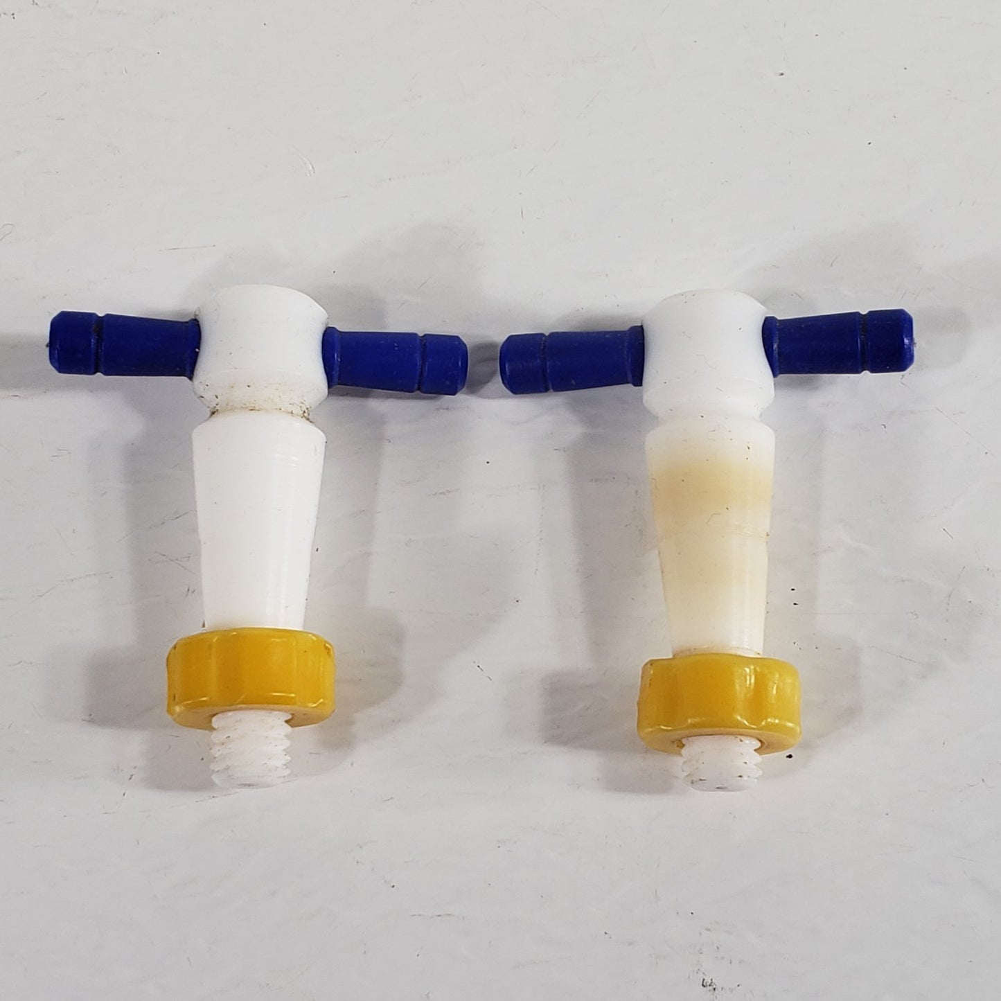 Two PTFE 13/24mm 2mm Bore Tapered Stopcocks, Blue w/Yellow Screw-In Nuts