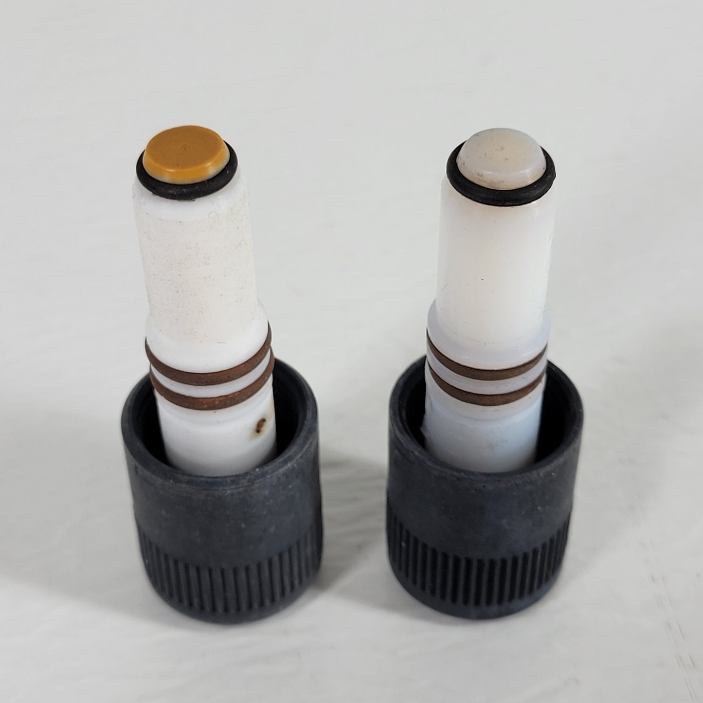 Two CHEMGLASS PTFE 0-12mm Vacuum Valve Plug-Only for Vac. Systems, Brown & Black