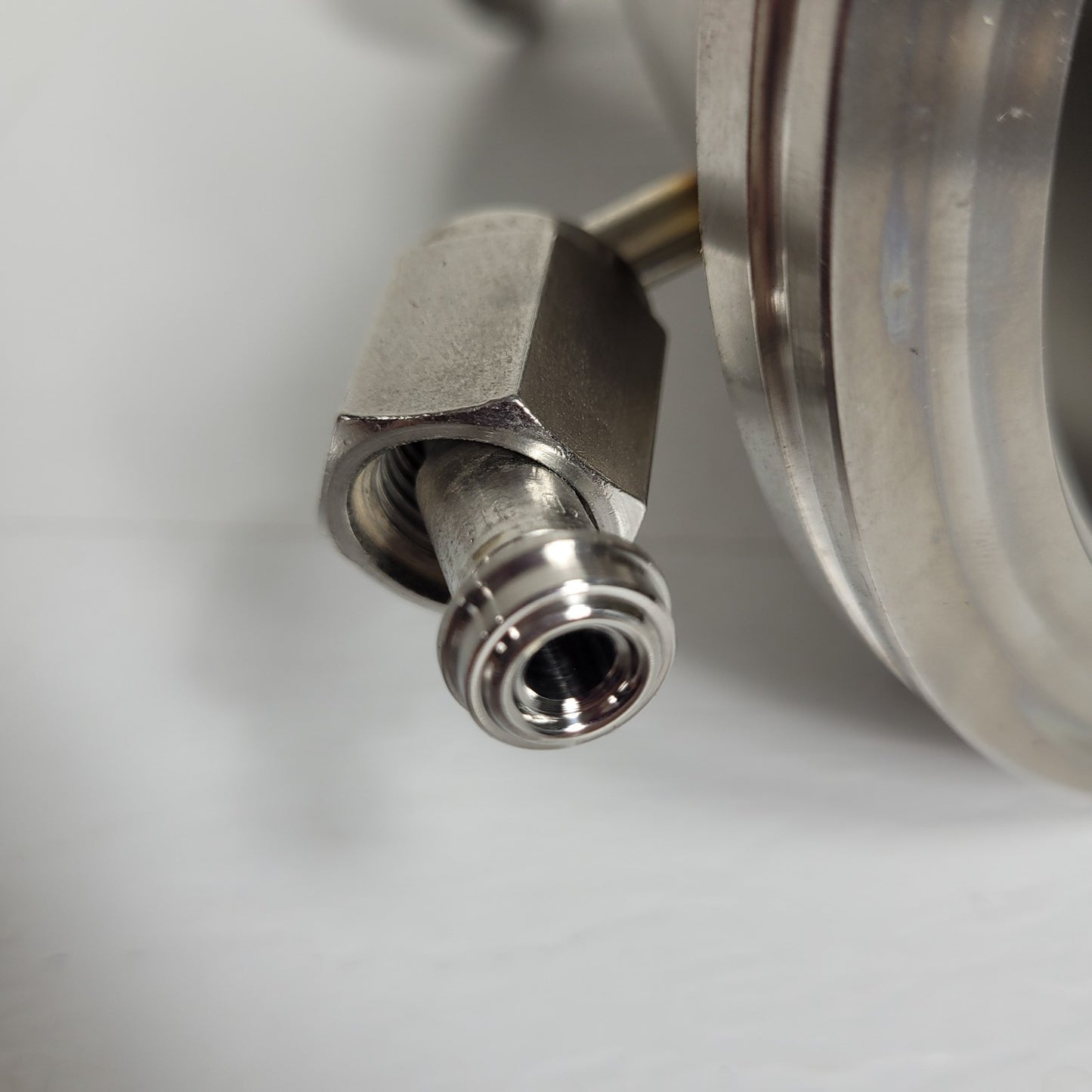 ISO-K100 to KF40 High Vacuum 90° Elbow Adapter Tee w/ 1/4" VCR Side Port