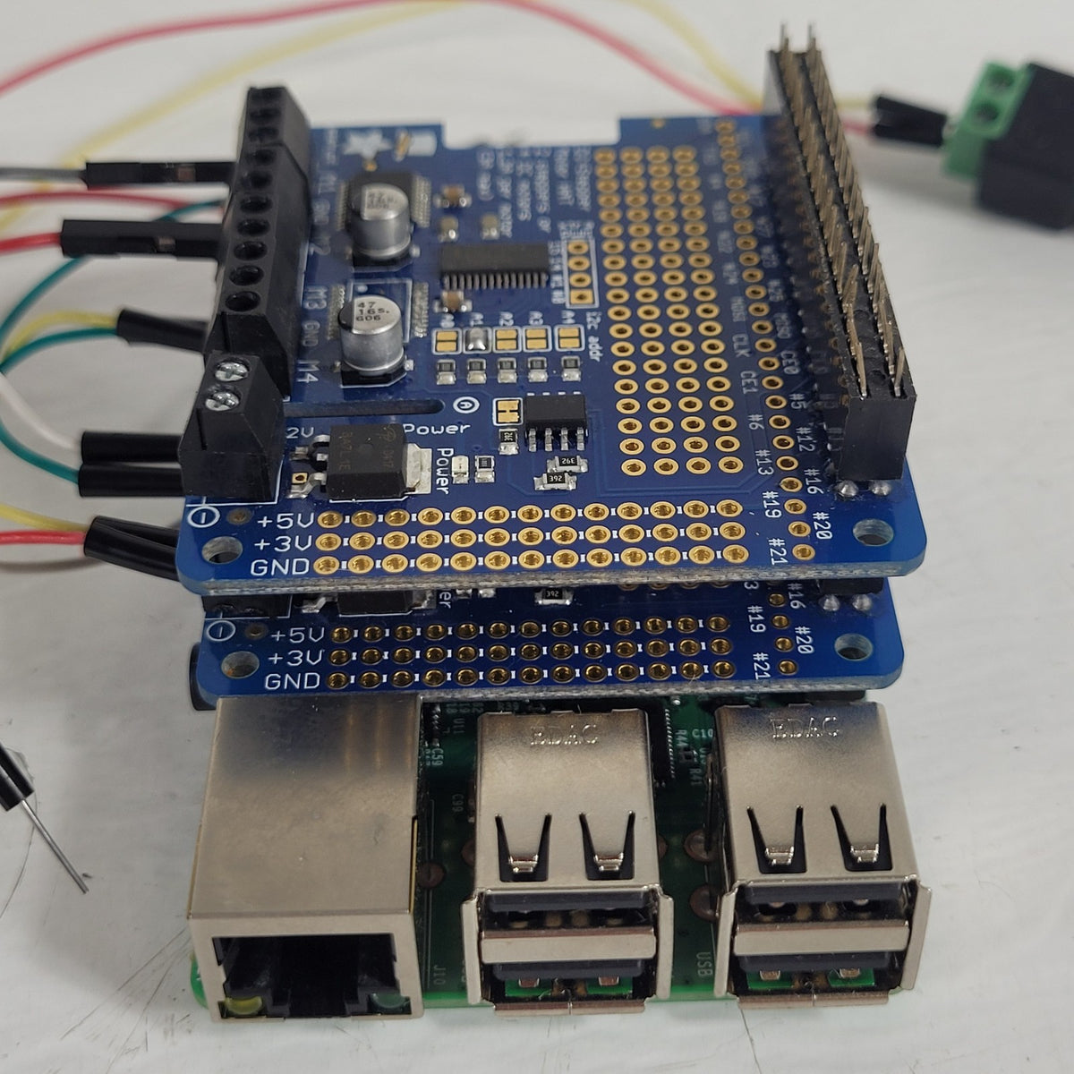 Raspberry Pi 3 Model B+ 1GB w/ 2 Adafruit DC Stepper Motor HATs 2348
