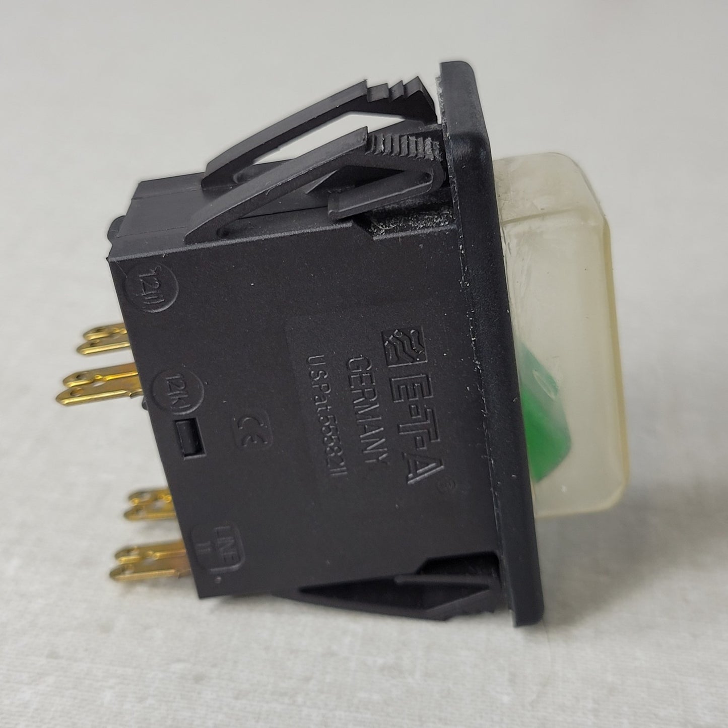 ETA 3120-F324-P7T1-W19DB3 20A 50VDC 240VAC Green Rocker Style Breaker Switch