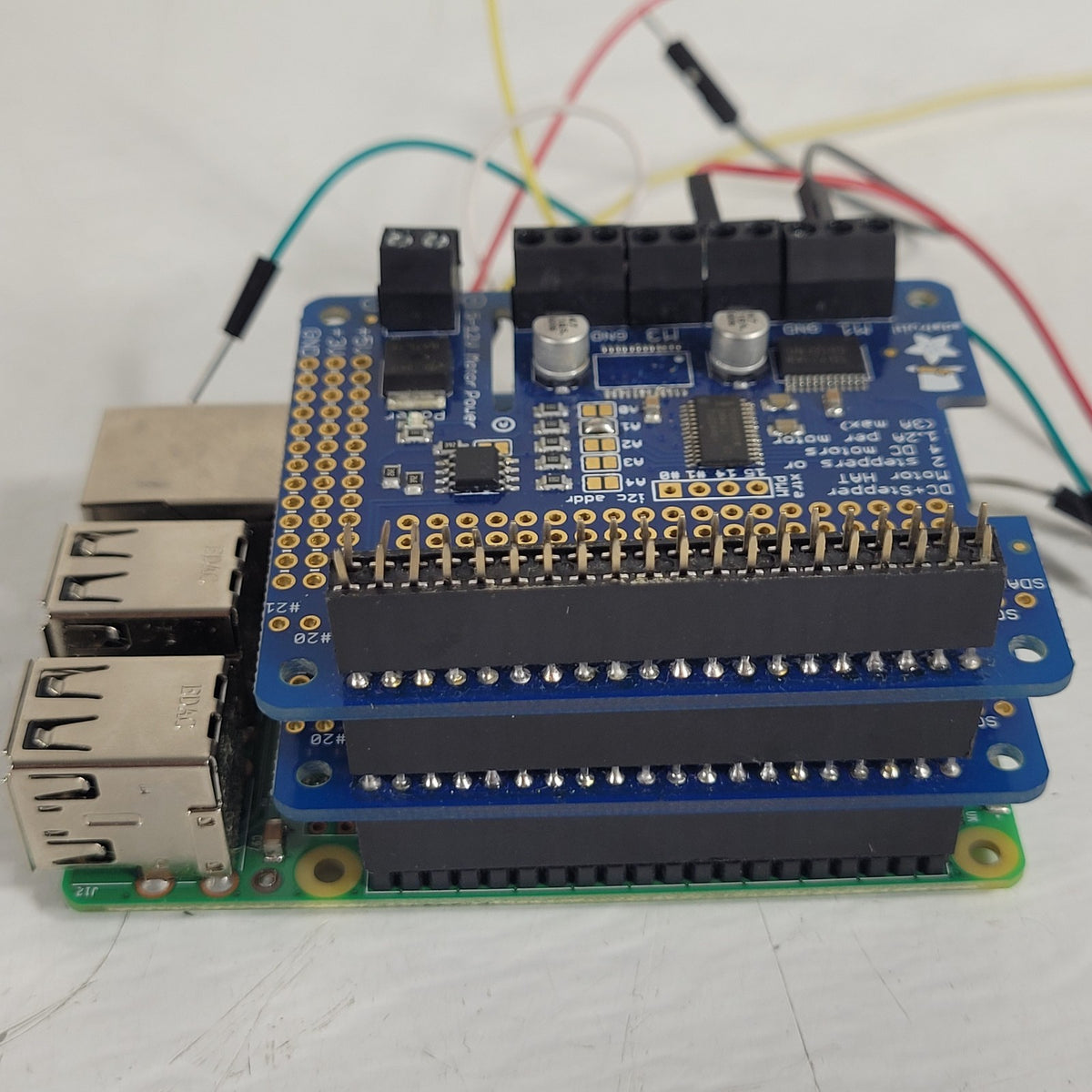 Raspberry Pi 3 Model B+ 1GB w/ 2 Adafruit DC Stepper Motor HATs 2348