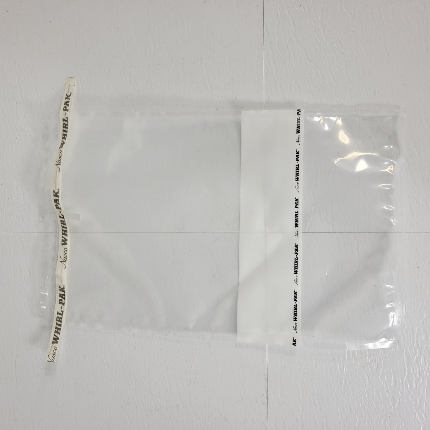 Open Box Nasco Whirl-Pak Sample Bag Puncture Proof Tabs, Pack of ~500