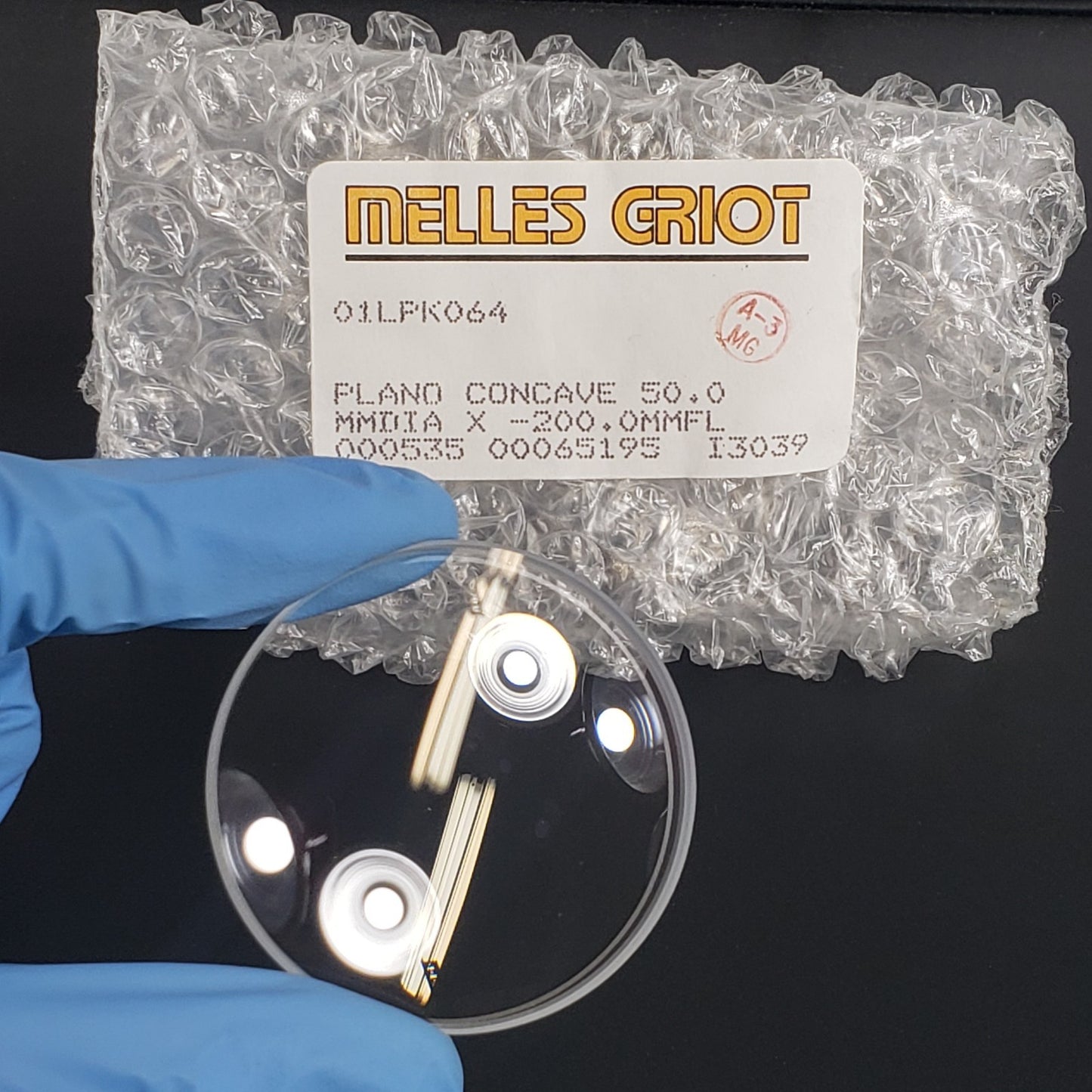 Melles Griot 01LPK064 Plano Concave 50mm Dia x -200mmFL For Optical Applications