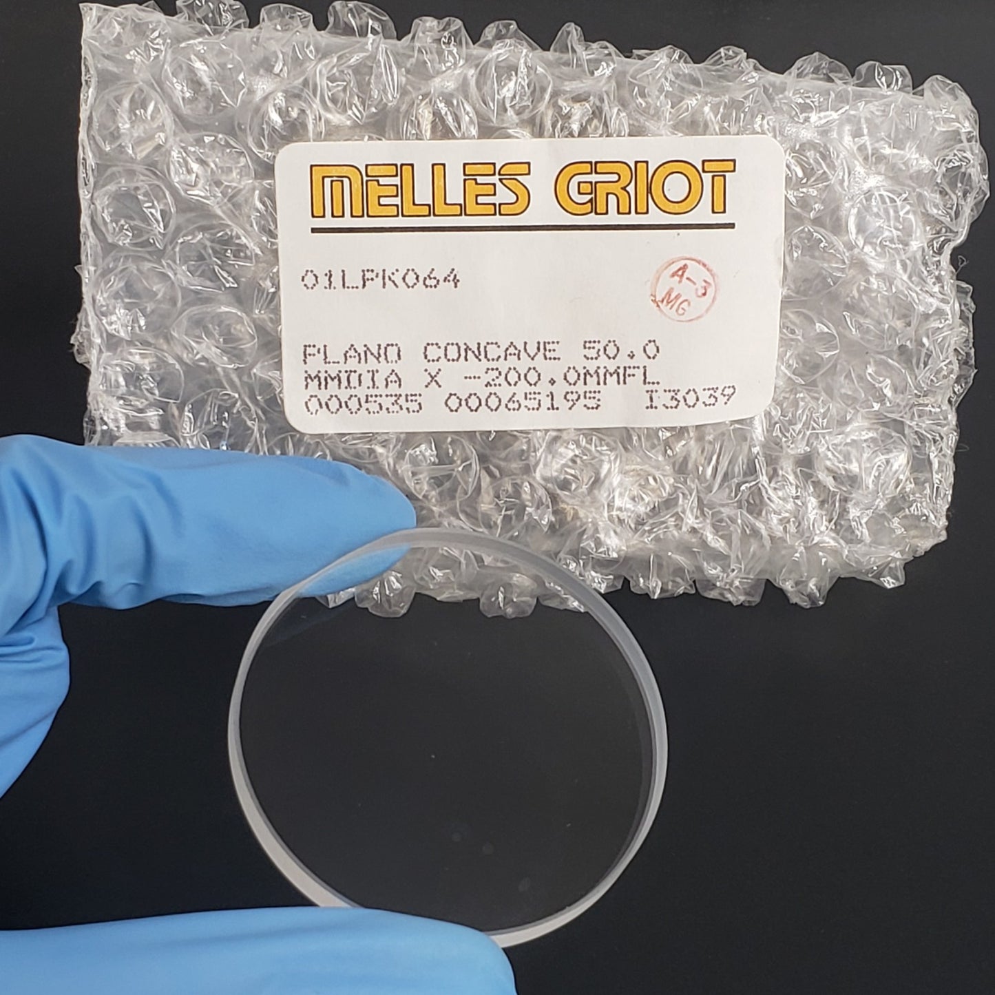 Melles Griot 01LPK064 Plano Concave 50mm Dia x -200mmFL For Optical Applications