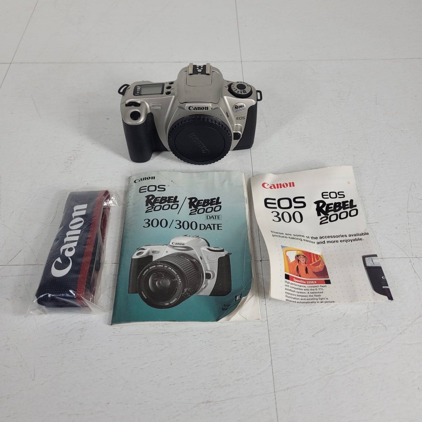 Canon EOS Rebel 2000 35mm Film SLR Camera w/ Manual and Sling Strap