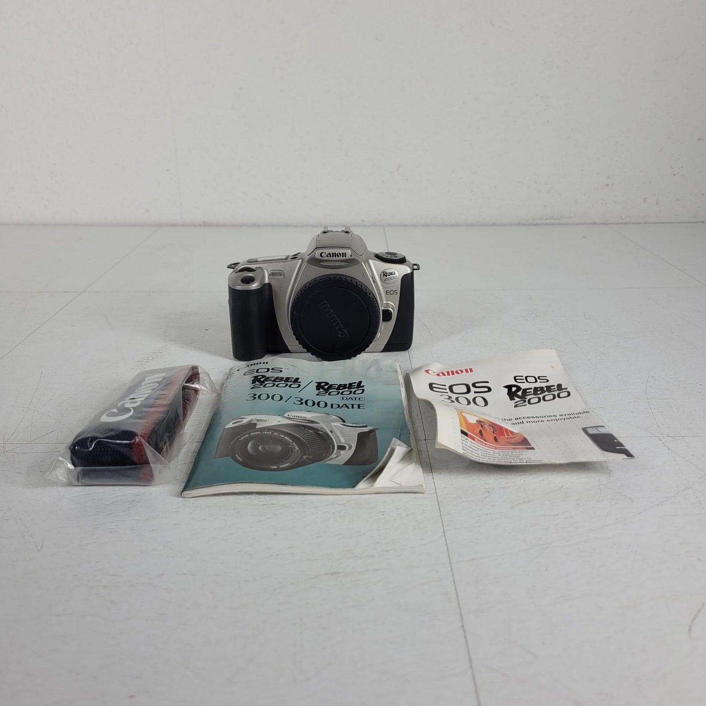 Canon EOS Rebel 2000 35mm Film SLR Camera w/ Manual and Sling Strap