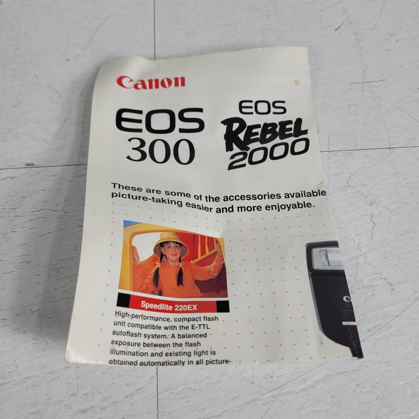 Canon EOS Rebel 2000 35mm Film SLR Camera w/ Manual and Sling Strap