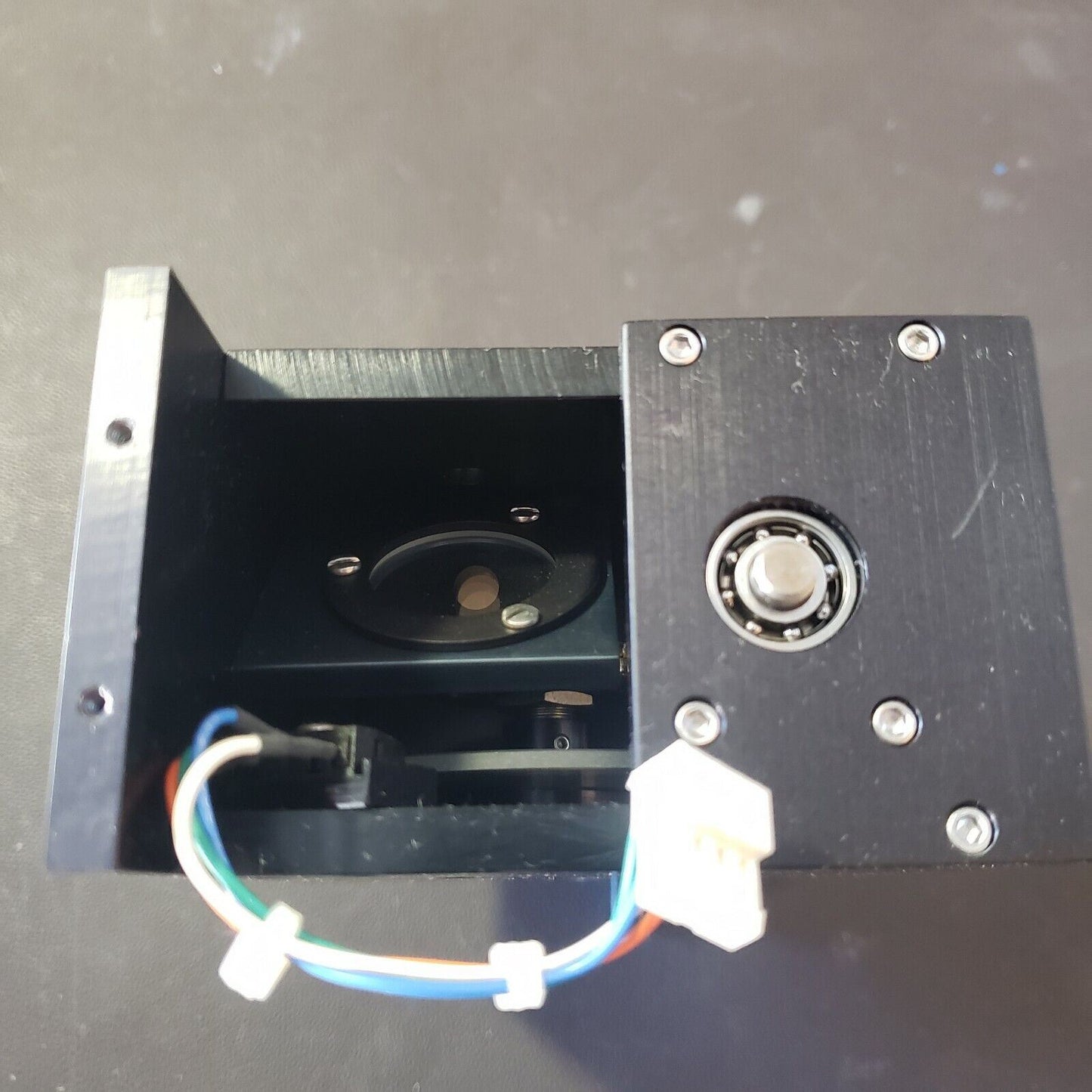 High Power Selective Optical Pathway System Stepper Driven Beam Block