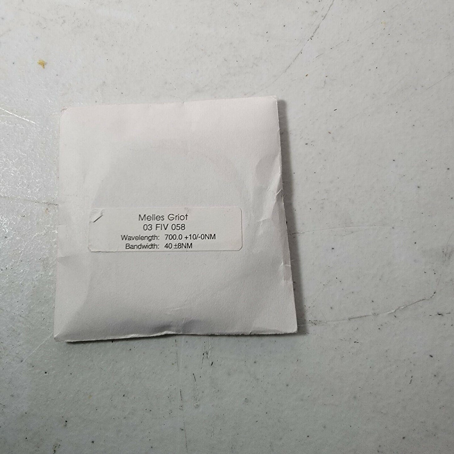 Melles Griot 03 FIV 058 Optical Filter 700+10nm Wavelength 40+/-8nm BW