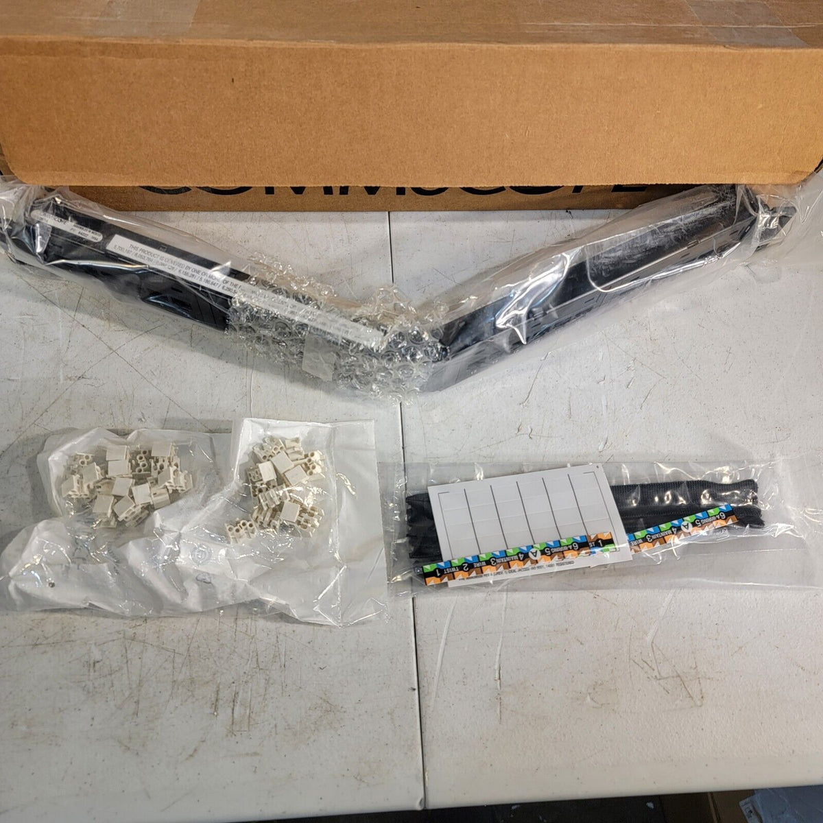 Angled Distribution Module Panel CommScope 760162834 Angled Distribution Module Panel Cat 6A UTP 2U 48 ...
