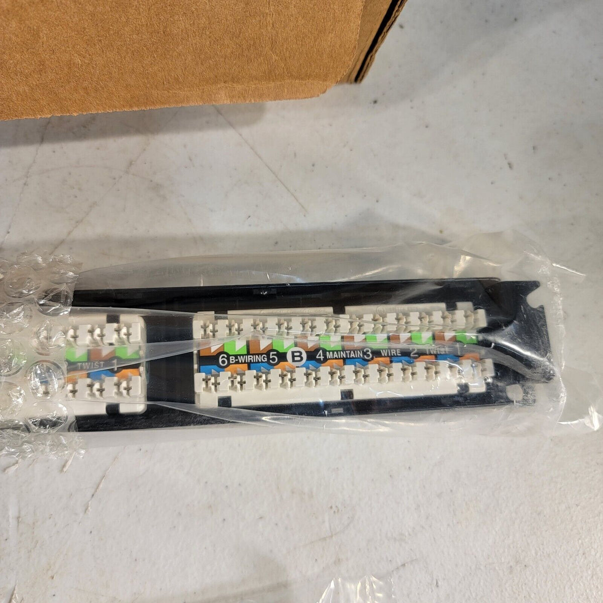 Angled Distribution Module Panel CommScope 760162834 Angled Distribution Module Panel Cat 6A UTP 2U 48 ...