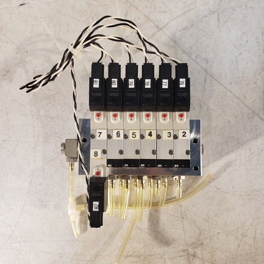 Koganei 040M6A-64W Manifold Block with (7) A040-4E1-37W Solenoid Valves 0.3MPa