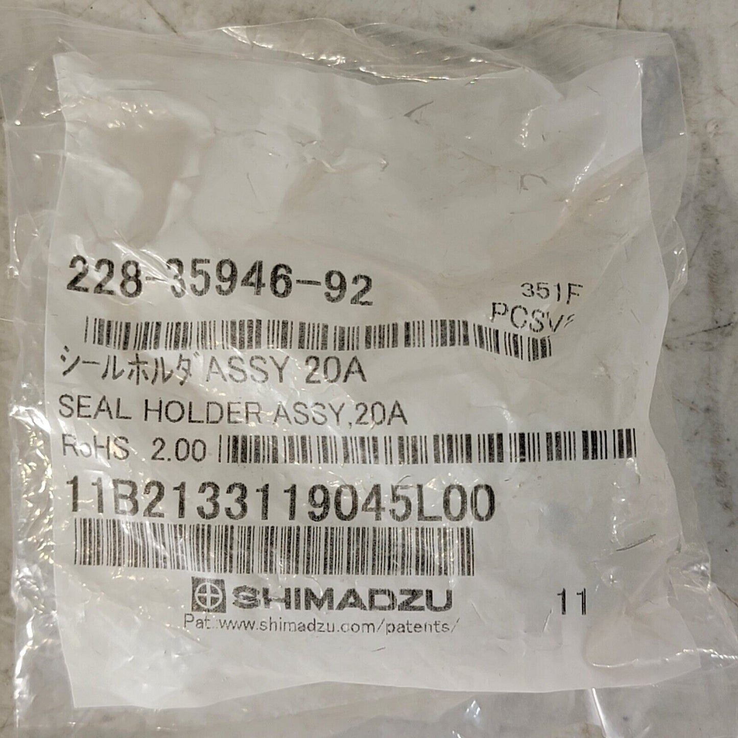 Used Shimadzu 228-35946-92 Rinse Seal Holder Assembly for LC-20AT
